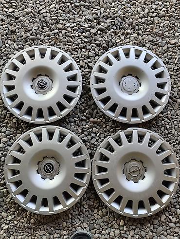 бампер опель вектра б: Məhsul: Orijinal GM təkər örtükləri (hubcap) – 4 ədəd dəst — 1