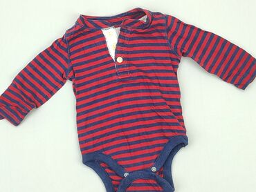 kombinezon granatowy w kwiaty: Body, Gap, 3-6 m, 
stan - Bardzo dobry