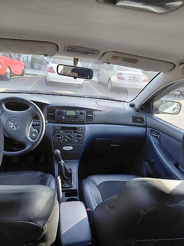 электр авто: Toyota Corolla: 2002 г., 1.6 л, Кол менен иштөөчү, Бензин, Хетчбек — 6