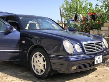 mers: Mercedes-Benz 230: 2.3 l | 1996 il Sedan
