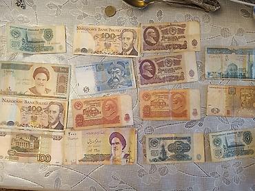 Kolleksiya üçün müxtəlif ölkələrin köhnə kağız pulları. Dəstdə