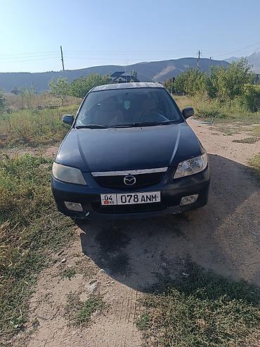 прокладка впускного коллектора: Mazda 323: 2001 г., 1.6 л, Механика, Бензин, Универсал — 4