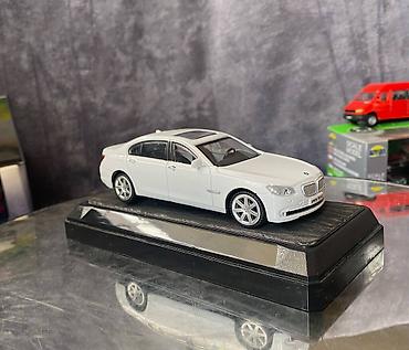 Avtomobil modelləri: Коллекционная модель BMW 750i F02 white 2008 RASTAR Scale 1:43 Art — 11