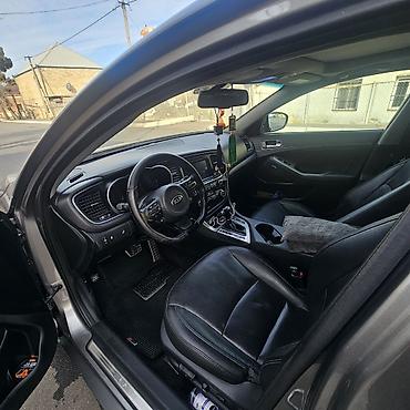 kia optima spoyler: Kia Optima Turbo – sedan Xüsusiyyətlər: - Turbo benzin mühərriki — 5