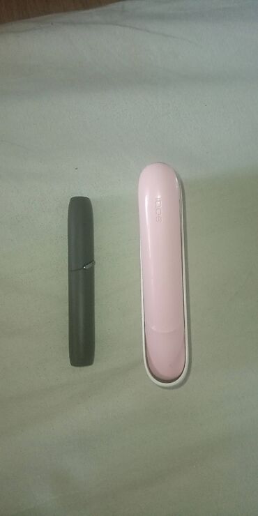 Qəlyan, vayp və aksesuarları: IQOS 3 DUO dəsti, tütün qızdırıcısı və portativ şarj cihazından