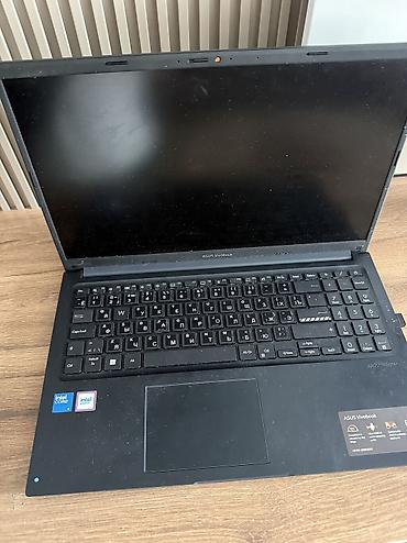 Ноутбук ASUS VivoBook 15 (модель серии X150x, на экране — ASUS