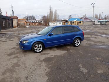 машина а: Mazda 323: 2002 г., 1.6 л, Механика, Газ, Хетчбек