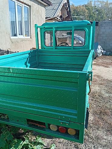 электрический грузовик: Грузовой электротрицикл с закрытой кабиной и металлическим бортовым — 1