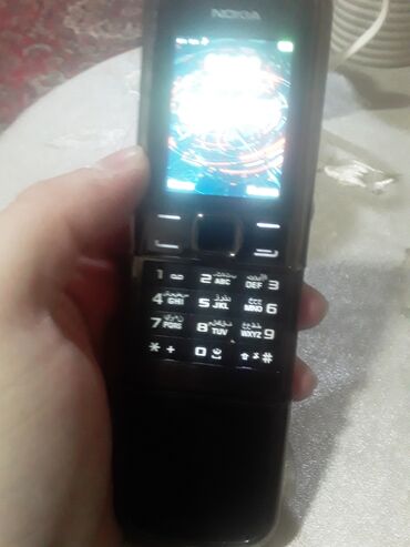 telefon a02: Satılır nokia 8800 pakovkadadı qutusu hər bir şeyi var hec bir