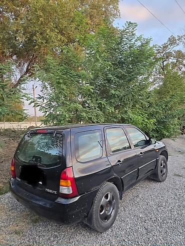магнитола мазда: Mazda Tribute: 2001 г., 2 л, Механика, Бензин, Кроссовер — 9