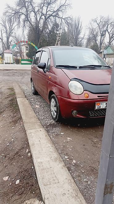 Другие автомобили: Компактный городской хэтчбек бордового цвета. Основные особенности: - — 4