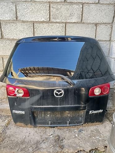 боз белер: Дверь багажника (крышка багажника) Mazda Demio (Mazda 2), чёрная 4000 — 1