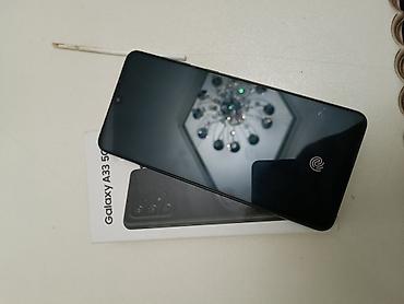 Мобильные телефоны: Samsung Galaxy A33 5G, цвет - Черный, Отпечаток пальца — 2