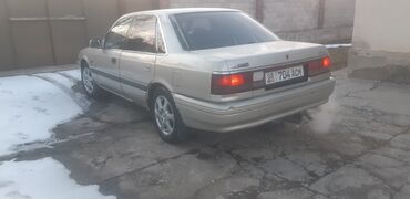 семиместный авто: Mazda 2: 1990 г., 2 л, Механика, Газ, Седан