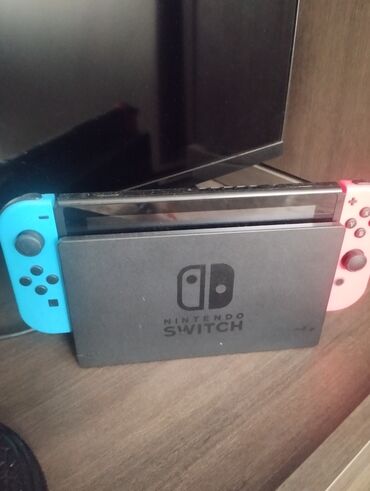 цена нинтендо свитч: Портативная игровая консоль Nintendo Switch в док-станции. Оснащена