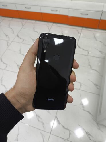 Xiaomi: Xiaomi Redmi 7, 32 GB, rəng - Qara, 
 Sensor, Barmaq izi, İki sim kartlı