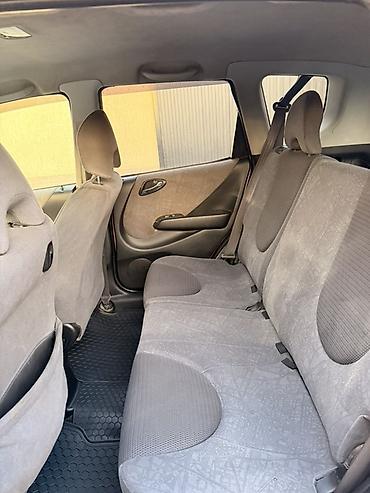 ролики на фит: Honda Fit: 2002 г., 1.3 л, Автомат, Бензин, Хэтчбэк — 3