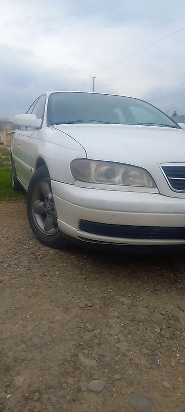 ford sedan: Opel Omega: 2.2 l | 1999 il 300000 km Sedan — 3