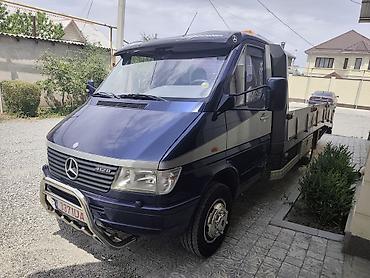 сапог двухскатный: Эвакуатор, Mercedes-Benz, 1996 г., Прямая — 3