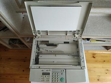 tercume aparati: Şəkildə gördüyünüz Canon SmartBase PC1210D modelidir. Bu — 2