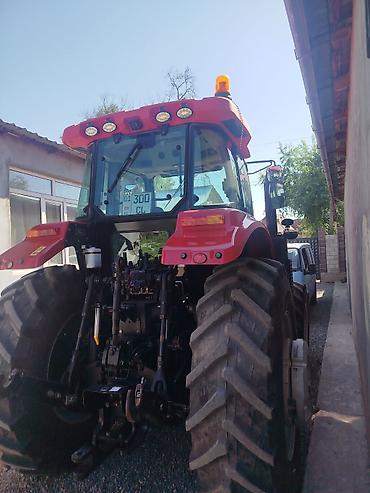 r15 100: Трактор сельскохозяйственный (красный, колесный, 4х4) Описание: - — 2
