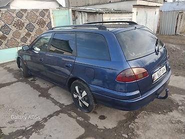 Другие автомобили: Просторный универсал синего цвета. Основные особенности: - Кузов — 2