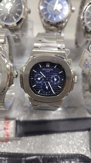 bakida saat: Patek Philippe Nautilus üslubunda kişi saatları – polad korpus və — 8
