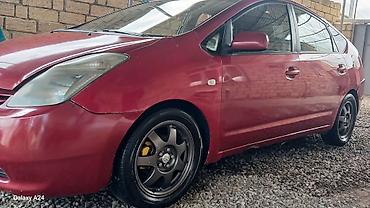 pirus disk: Toyota Prius (2-ci nəsil) – qırmızı rəngdə hibrid hetçbek. Salam — 5