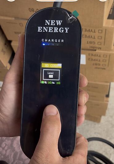 elektrik acar: Elektrikli avtomobillər üçün “New Energy Charger” şarj cihazı. Adi — 3