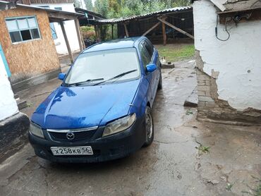 тико машино: Mazda 323: 2002 г., 1.5 л, Автомат, Бензин, Седан