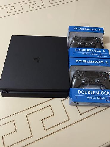 dvd oyun: PlayStation 4 Slim – 1 TB - Model: PS4 Slim (qara) - Yaddaş: 1 TB – — 1