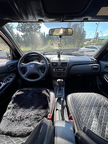mini canta: Nissan Sunny: 1.6 l | 2006 il Sedan — 1