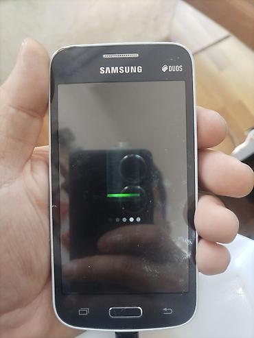 telefon tutacagı: Samsung GT-S7220, rəng - Qara, İki sim kartlı — 1