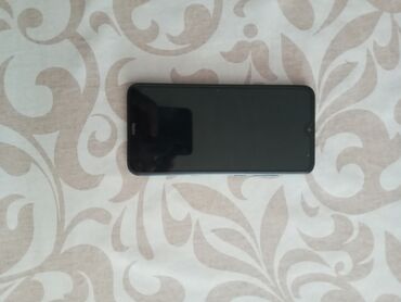 телефон fly q200: Xiaomi Redmi 8A, 32 ГБ, цвет - Черный, 
 Кнопочный