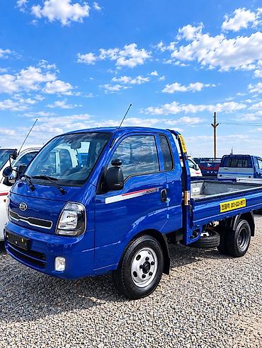 күзгү: Kia Bongo III, малотоннажный бортовой грузовик (синий). Кузов и — 2