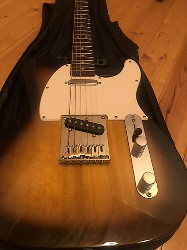 Gitaralar: Telecaster
Squier Fender
Ideal
Simler Yeni deyisib — 2