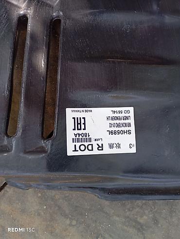 patkrilnik: Mitsubishi Montero 2001–2002 sağ ön qanad içliyi (inner fender liner) — 2