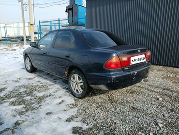 Mazda: Mazda 323: 1995 г., 1.5 л, Механика, Бензин, Седан