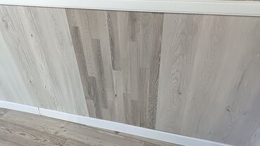 Laminat: Məhsul: Laminat döşəmə örtükləri və aksesuarları Təsvir: - Mağazada — 9