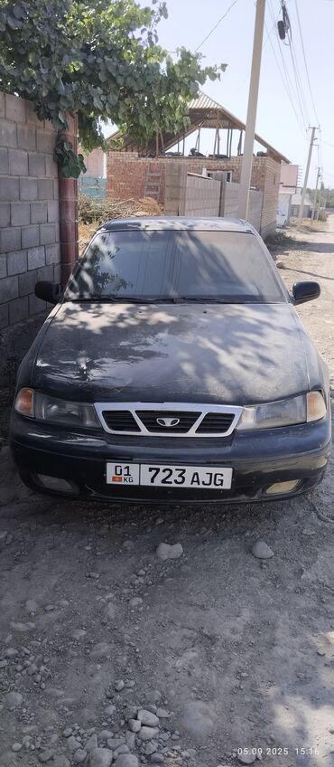 машинка для полировки фар: Daewoo Nexia, седан, черный цвет, киргизские номера 01 KG 723 AJG