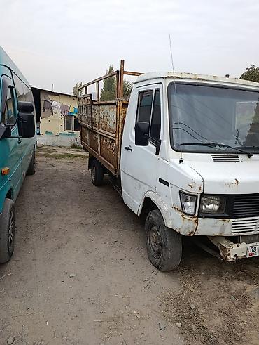 34 е: Грузовой бортовой микро-грузовик с высокой металлической платформой — 2