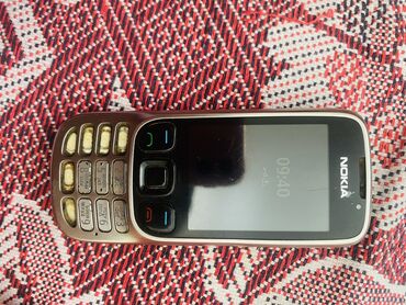 kredit telefonlar ilkin odenissiz 2022: Nokia 6700 Slide, rəng - Gümüşü, Düyməli