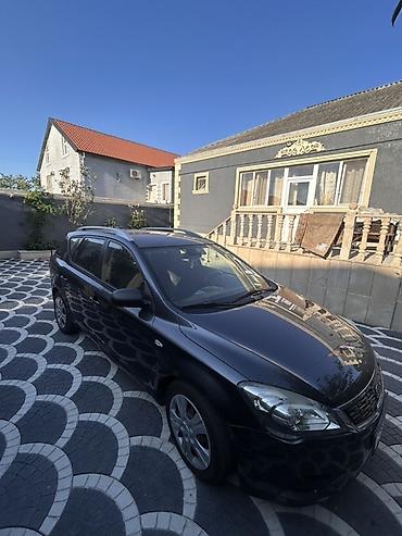 kia optima nece masindi: Kia Cee’d SW (universal), tünd boz rəng. - Gövdə tipi: universal (SW) — 2