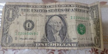 1 dollar satıram: 1995-in 1 dollarıdı, işlənmiş vəziyyətdədi. real alıcılara endirim