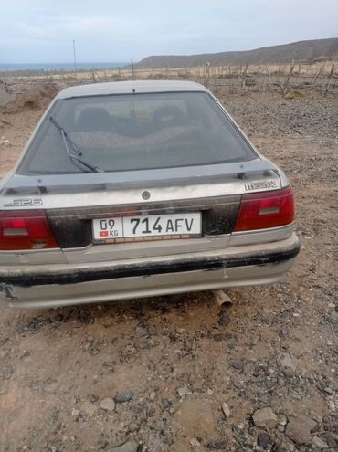 hyundai accent машына: Автомобиль Mazda 626, серебристого цвета. Задние фонари и