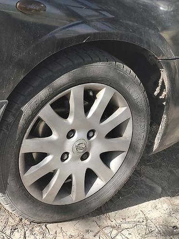 4 108: Nissan Almera Classic: 2004 г., Седан — 2