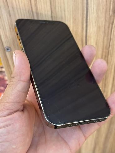 Уюлдук телефондор жана аксессуарлар: IPhone 12 Pro, 128 ГБ, модель MGLN3LL/A. Цвет — графит. На экране — 2