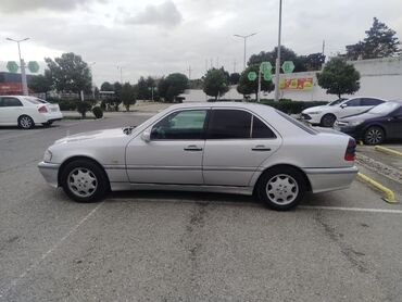 Mercedes-Benz: Mercedes-Benz C 240: 2.4 l | 1997 il Sedan — 5