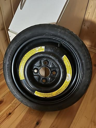 velosiped diski: Məhsul: Avtomobil üçün “donut” tipli ehtiyat təkər və disk (komplekt) — 1