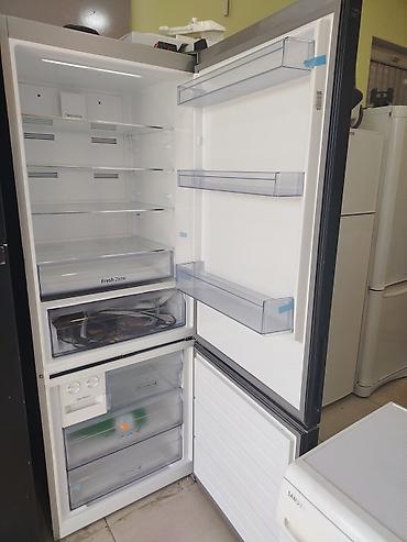 Soyuducular: İşlənmiş 2 qapılı Samsung Soyuducu Satılır, rəng - Qara, Təkərli — 2